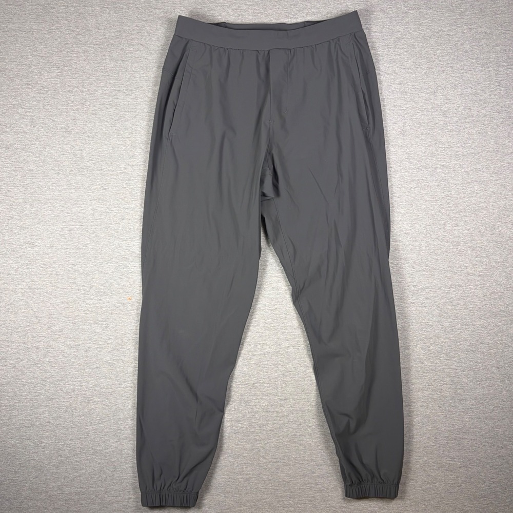 Lululemon Surge Joggers Mens M Graphite Gray Hybrid Pant Ankle Zip